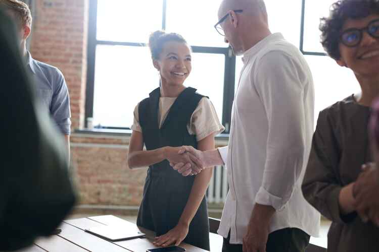 Man and woman shaking hands