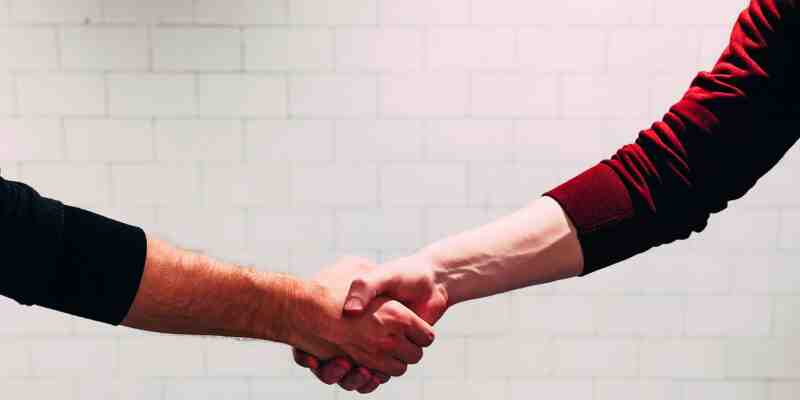 Two people shaking hands