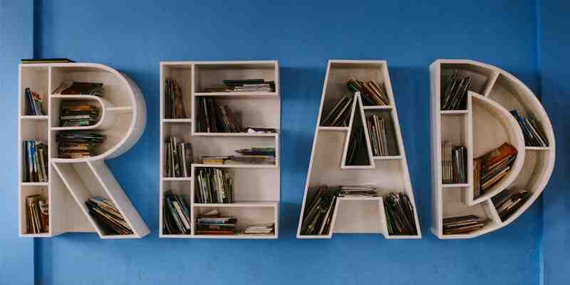 The word 'READ' spelled out as a bookshelf