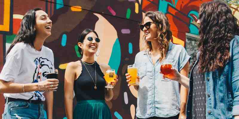 People standing around, drinking